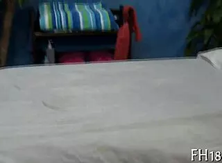 Bare nude girl gets full body massage session