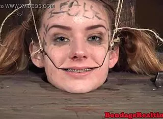 garage bound babe endures humiliating ring gag punishment