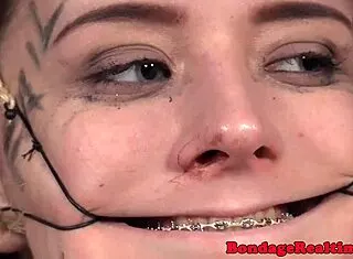 garage bound babe endures humiliating ring gag punishment