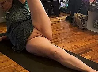 morning yoga stretches her milf curves teasingly