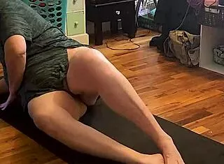 morning yoga stretches her milf curves teasingly