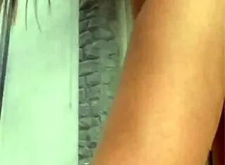 flashing tits and ass to construction workers across street