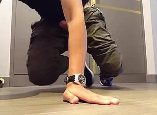 guy strokes cock hard while wearing sneakers