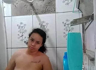 Hey, watch this hottie shower and flash her wet pussy!