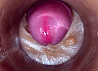 She spreads wide as precum drips into her pussy with camera deep inside vagina in 4K.