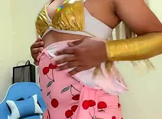 Pretty pink crossdressing trans with tasty tits poses seductively