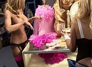 Four busty horny strippers finger and lick wet pussies backstage!
