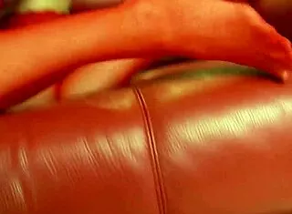 lesbian babes lick huge tits while rubbing throbbing pussies to cum