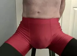 skinny stud grinds stool in tight black leggings red shorts flashing legs