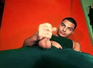 sexy chinese bodybuilder rubs spanish guitar on huge cock over carrot backdrop