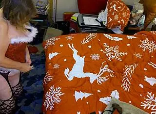 Granny Carmen Claus Takes Standing Doggystyle Creampie from Elf Helper!