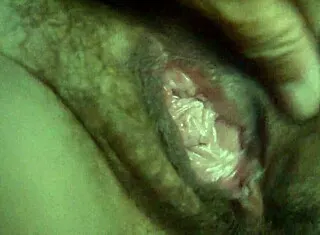 Teen Fingers Gaping Wet Hairy Pussy Close-Up In Low Light