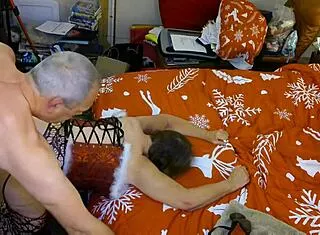 Granny Carmen Claus Takes Standing Doggystyle Creampie from Elf Helper!
