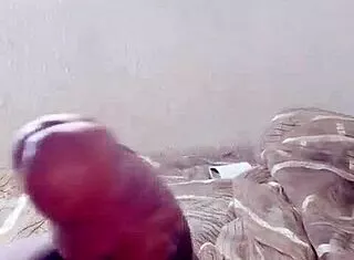 hey dude this african guy's stroking his juicy wet cock solo style