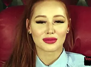 Redhead CFNM babe eyes wanker stroking her heels