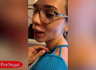 Eve Sweet plays wet pussy in glasses closeup