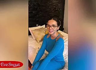 Eve Sweet plays wet pussy in glasses closeup