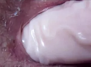 How deep can this huge dildo stretch her dripping wet pussy hole?