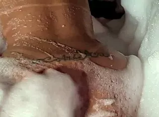 Foamy Bath Blowjob Turns Wild Fuck with Big Natural Tits Poolside