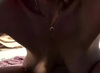 French milf fingers her hairy pussy outdoors at nudist beach! 🌞🍑