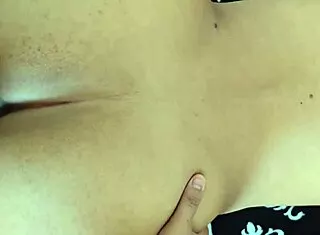 Single Latina Mom Bent Over Balcony While Kids Play Nearby