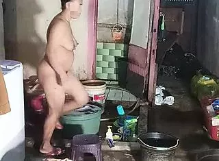 Indonesian Housewife Emak Emak Fingers Hairy Big Pussy While Washing