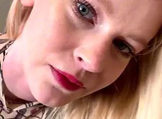 sophie van loo sizzles in grey leggings and heels on kitchen counter.