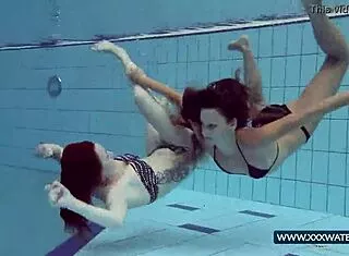 Katrin and Lucy flash big tits underwater