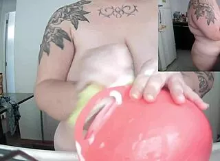 Naked Latina washes dishes with huge saggy tits swinging