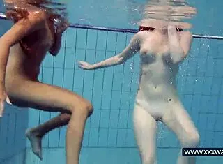 Katrin and Lucy flash big tits underwater