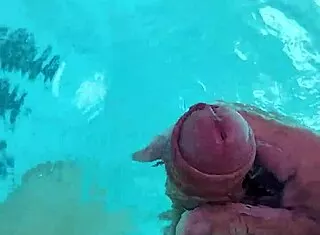 guy jerks cock naked poolside solo fun