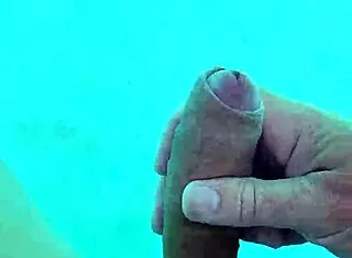 guy jerks cock naked poolside solo fun