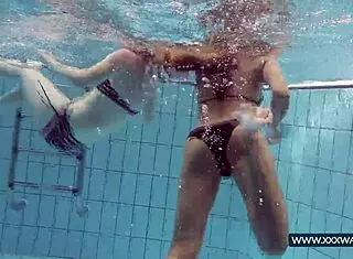 Katrin and Lucy flash big tits underwater