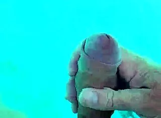 guy jerks cock naked poolside solo fun