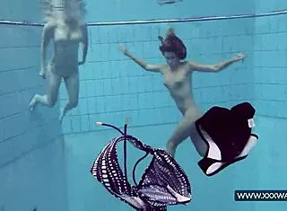 Katrin and Lucy flash big tits underwater