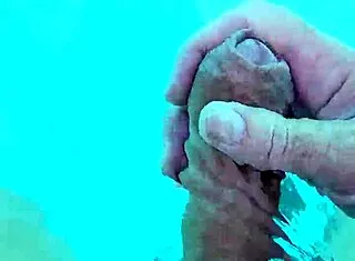 guy jerks cock naked poolside solo fun