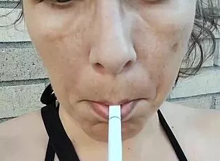 Kelly kendrick's big tits spill out smoking cigs outdoors
