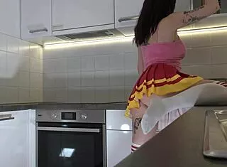 Hottest Redhead Tattooed Cheerleader Flashes See-Through Panties In Kitchen