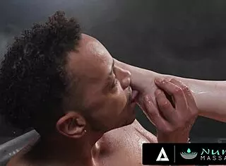 Busty Lindsay Lee slurps and rides client's oiled monster cock in nuru session