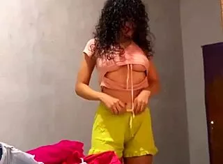 struggling to dress for work boss spies perfect latina body