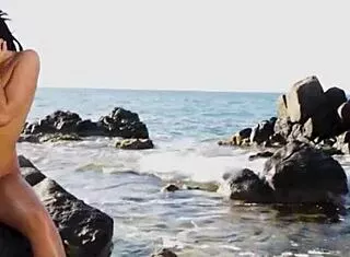 Petite Canadian MILF with big ass strips solo on beach outdoors