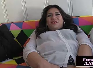 chubby ladyboy in stockings strokes fat cock while masturbating solo