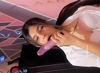 colombian college girl rocks huge dildo on bed flashing natural tits