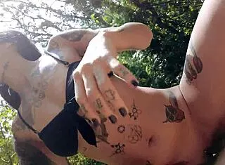 i love this tat girl's pierced nipples while outdoor anal gapes me