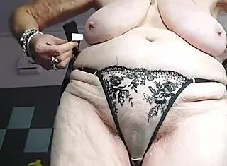 granny tries on new lingerie feeling sexy