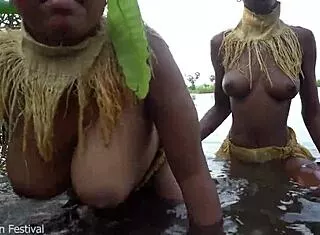 which zulu wife's big tits bathing better?