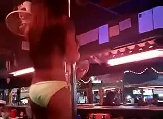 thai shemale ladyboy dances seductively on stage