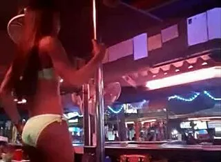 thai shemale ladyboy dances seductively on stage