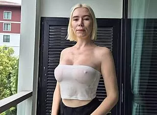 blonde crossdresser flashes big tits pussy in public transparent wet clothes contest