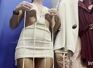 A Sexy Milf Slips Off Dress and Panties in Public Locker Room